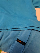 Load image into Gallery viewer, Hooded blanket in beaver scout blue showing how close the colour is to the beaver scout uniform colour