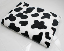 Load image into Gallery viewer, Cow print fleece fabric to be made into hooded blanket