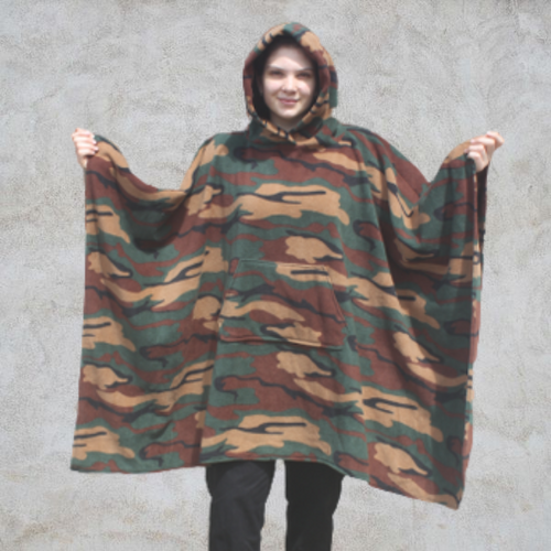 Girl wearing hooded blanket in jungle camouflage design print and front pocket