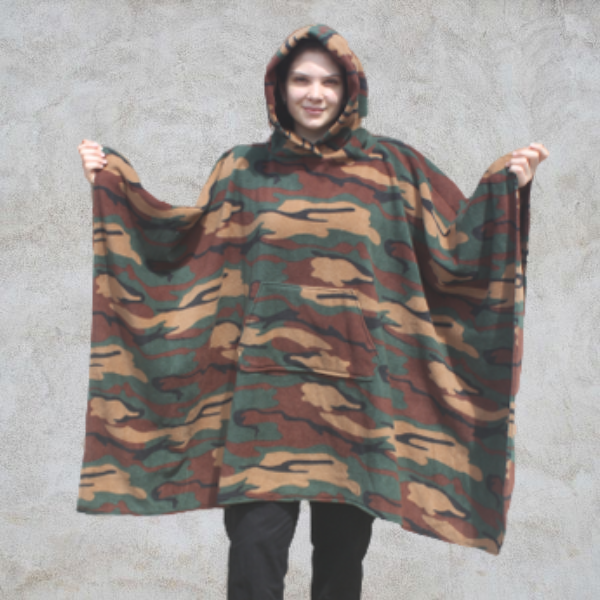 Girl wearing hooded blanket in jungle camouflage design print and front pocket